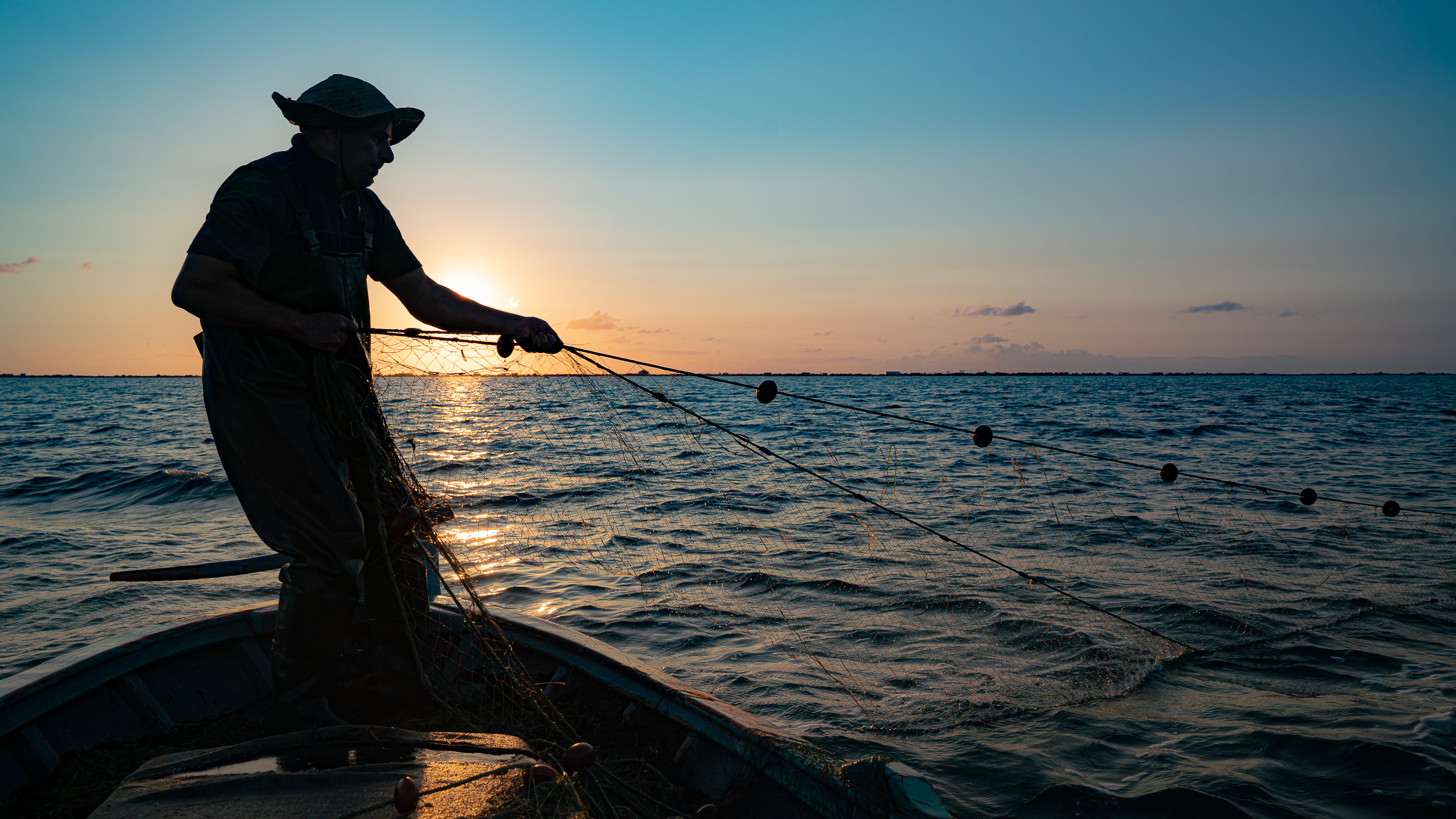 Fisherman in Ghar El Melh lagoon, Tunisia